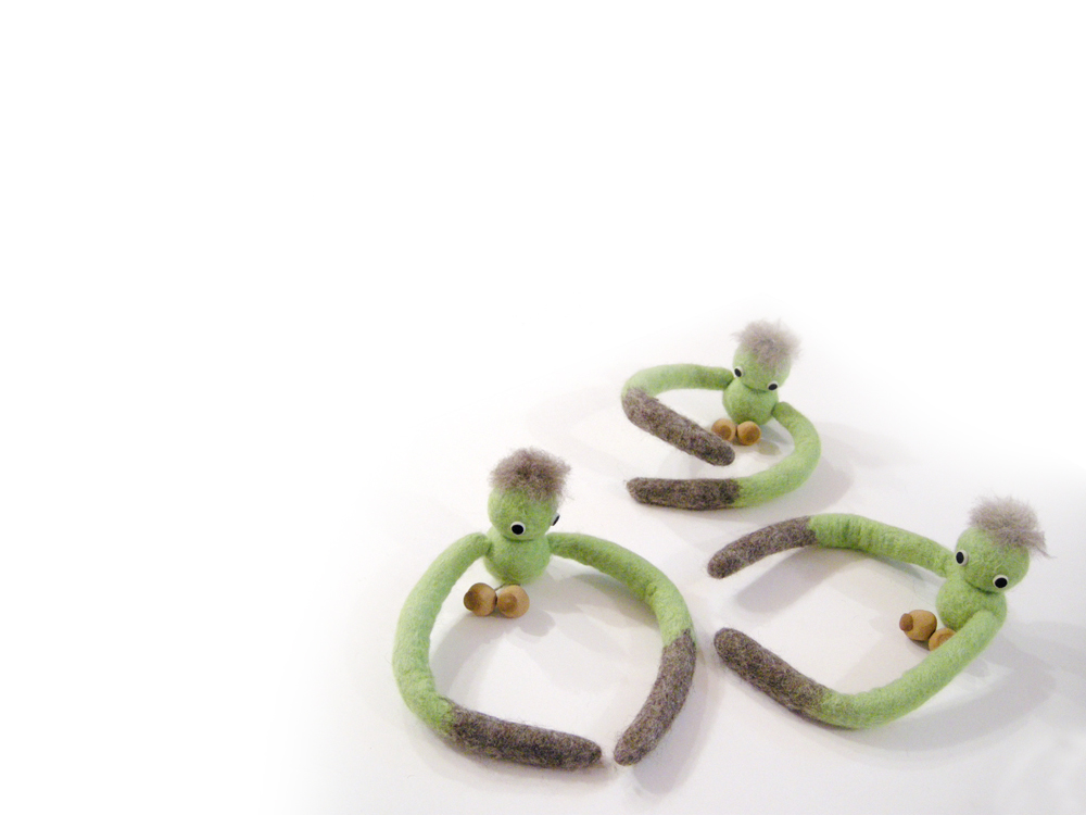 utan doll lime, made of 100% wool, fully moveable and bendable arms