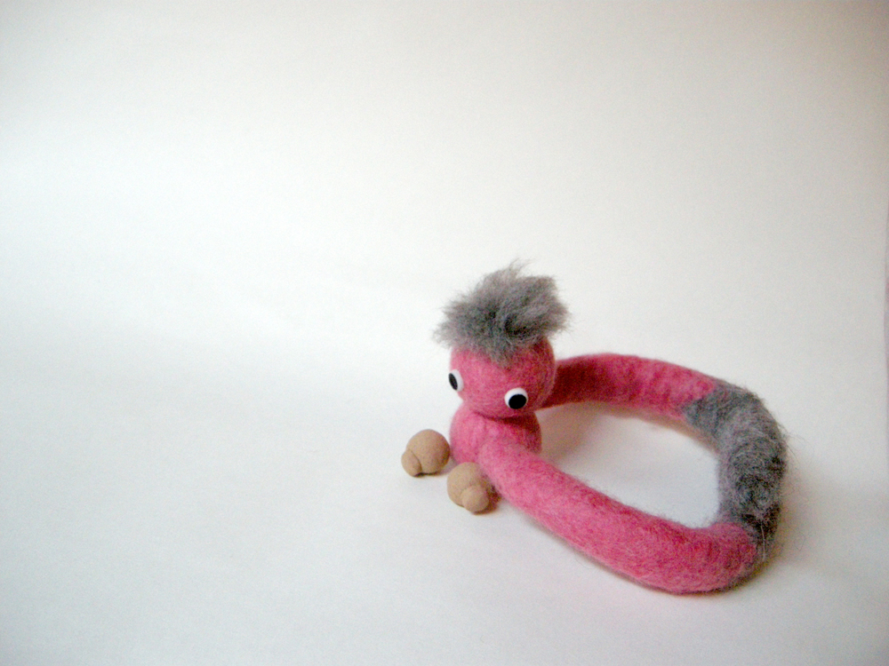 utan doll tomato, 2009 made of 100% wool, fully moveable and bendable arms